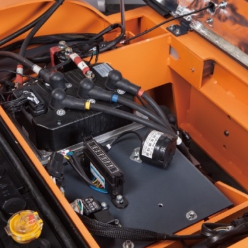 Zowell XTA40 4 ton electric tow tractor operating in warehouse